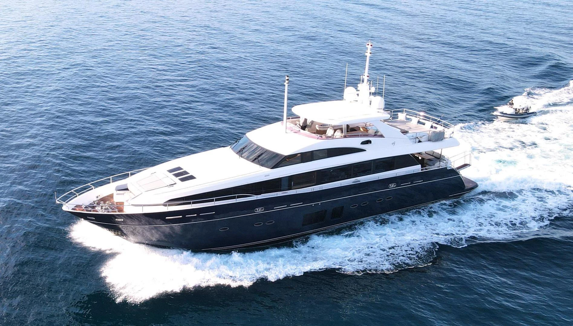 a large white yacht aboard M/Y FLY Yacht for Sale