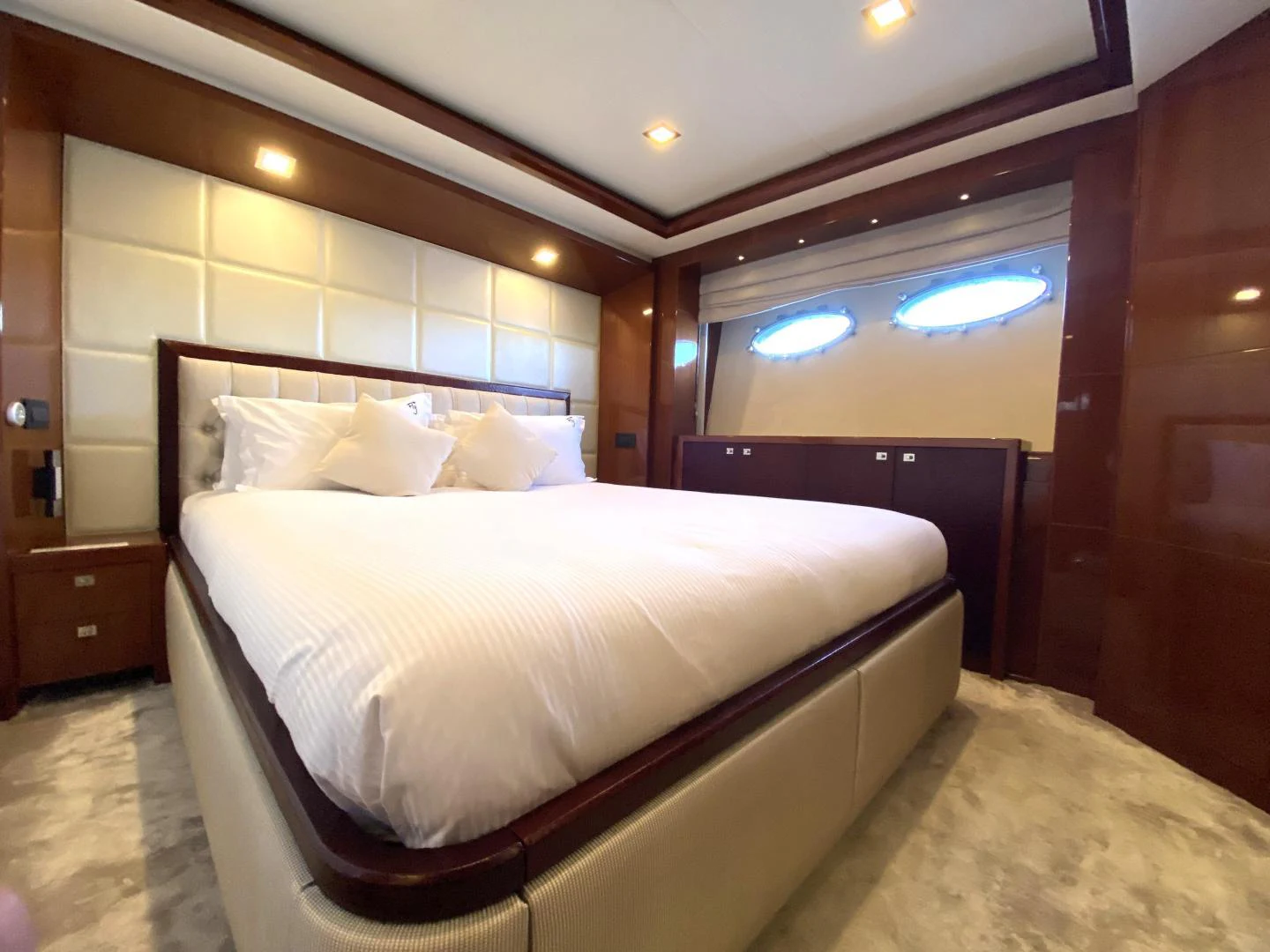 a bed in a room aboard M/Y FLY Yacht for Sale