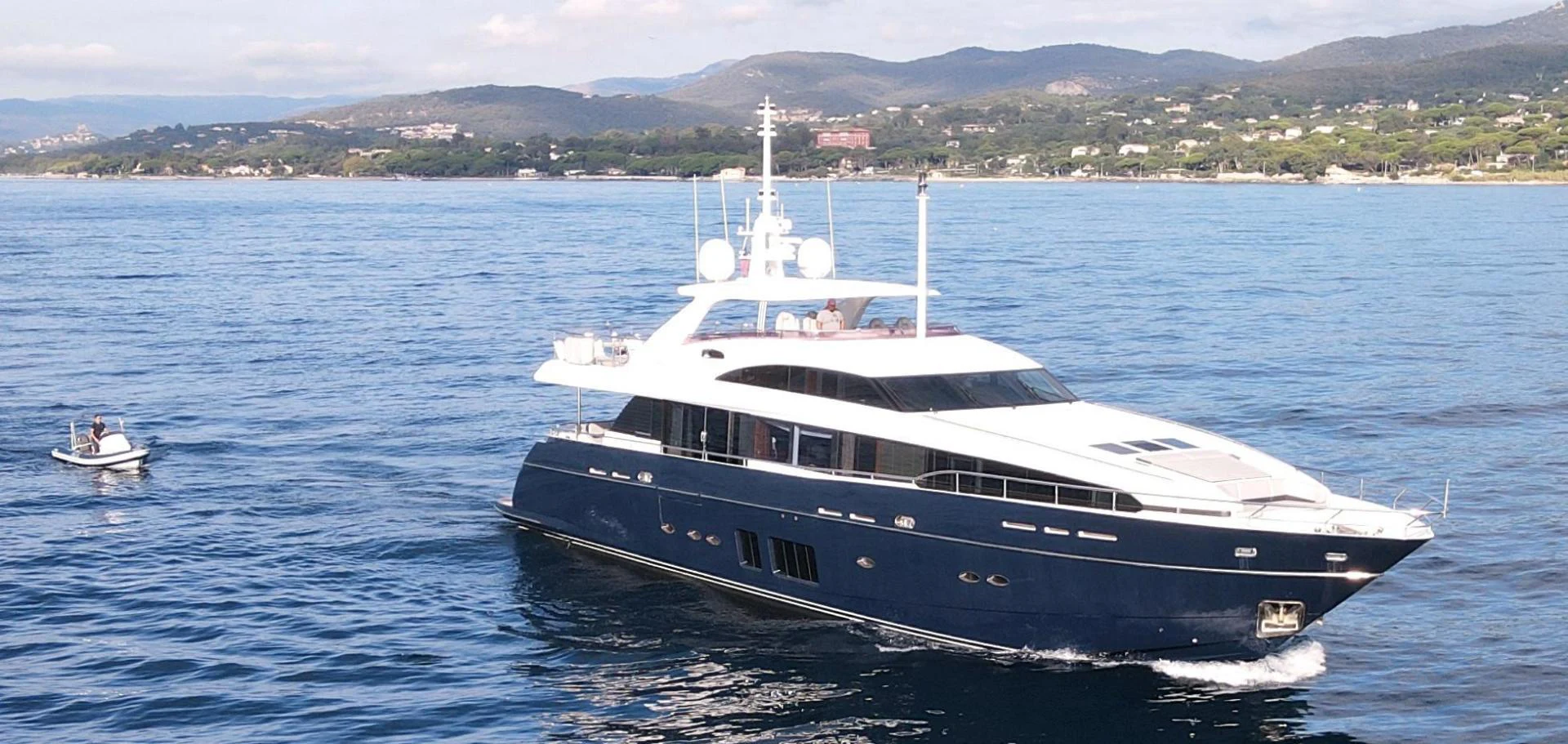 a large boat in the water aboard M/Y FLY Yacht for Sale