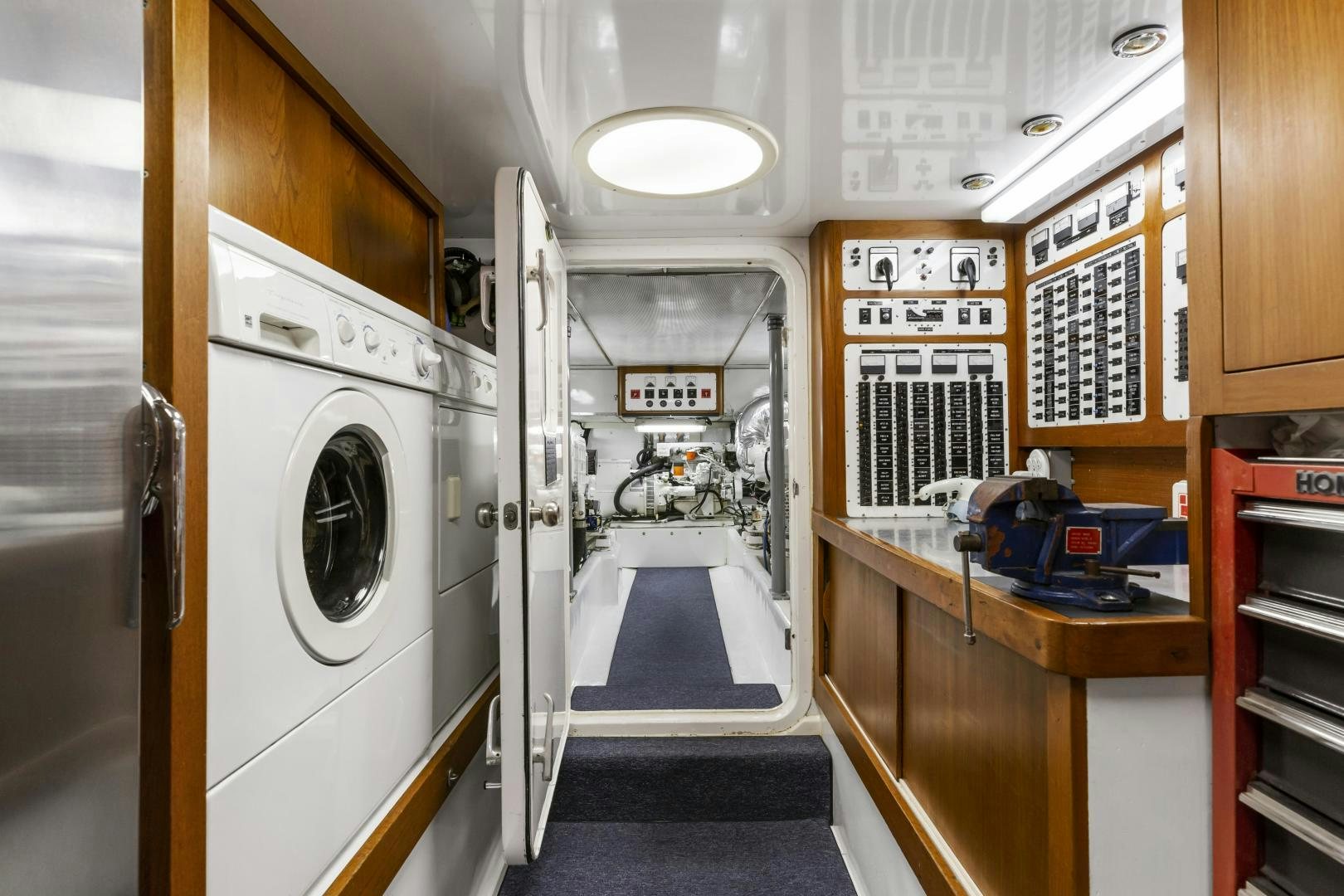 a laundry room with a washing machine aboard DON JUAN Yacht for Sale
