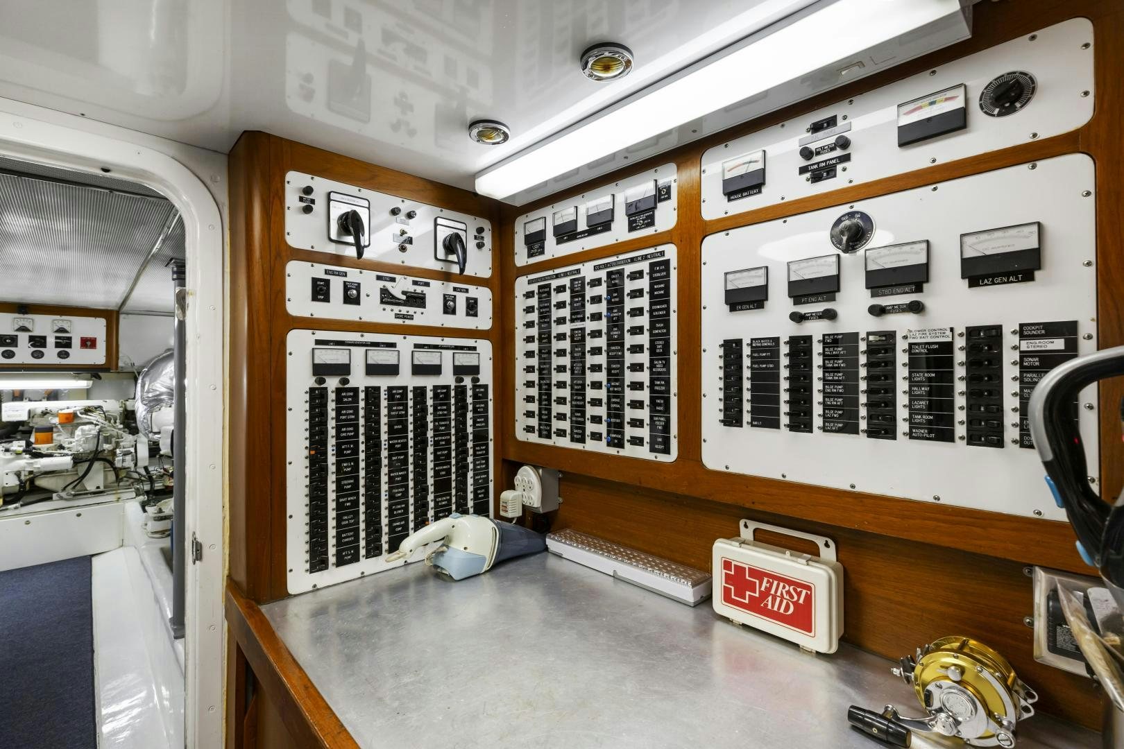 a room with a machine and boxes aboard DON JUAN Yacht for Sale