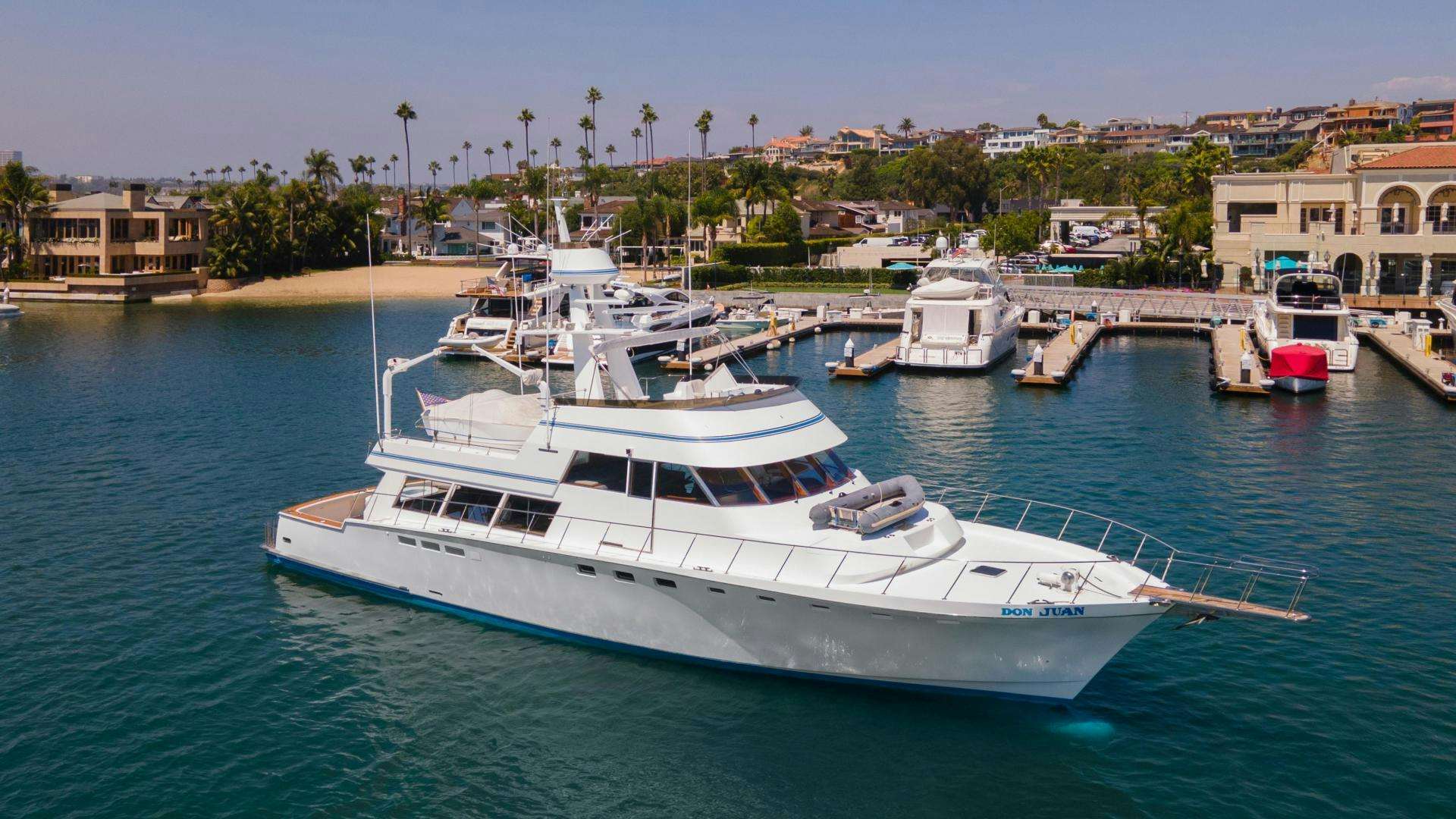 a boat docked at a pier aboard DON JUAN Yacht for Sale