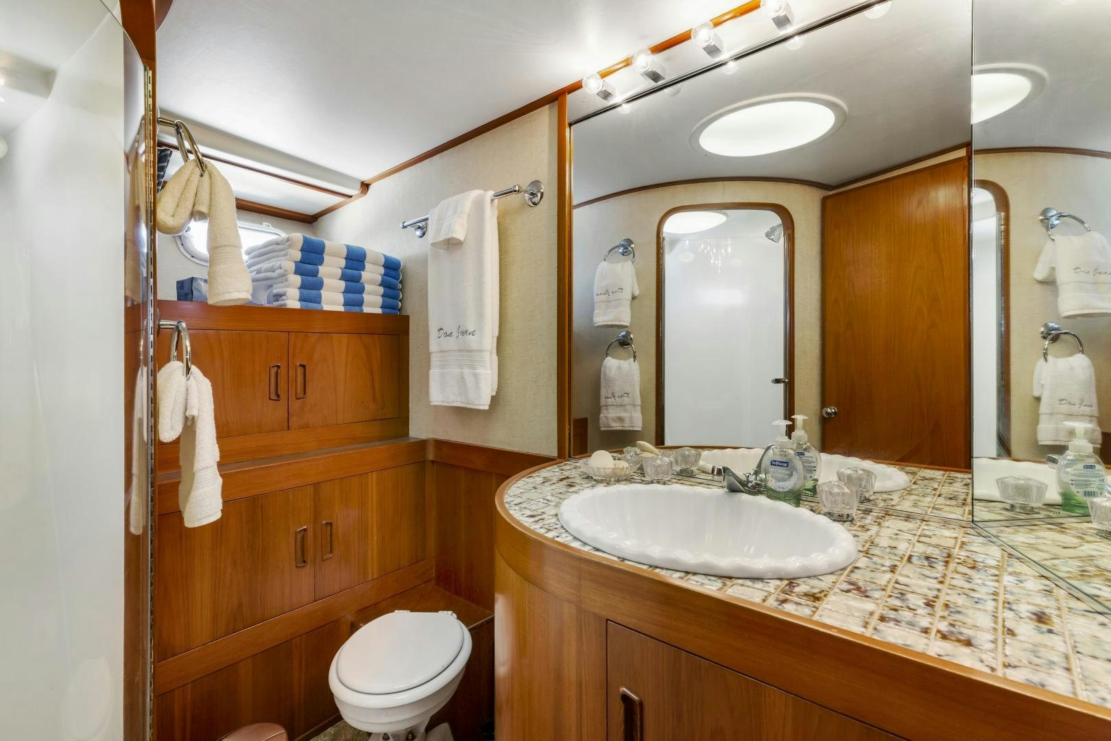 a bathroom with a sink and a mirror aboard DON JUAN Yacht for Sale