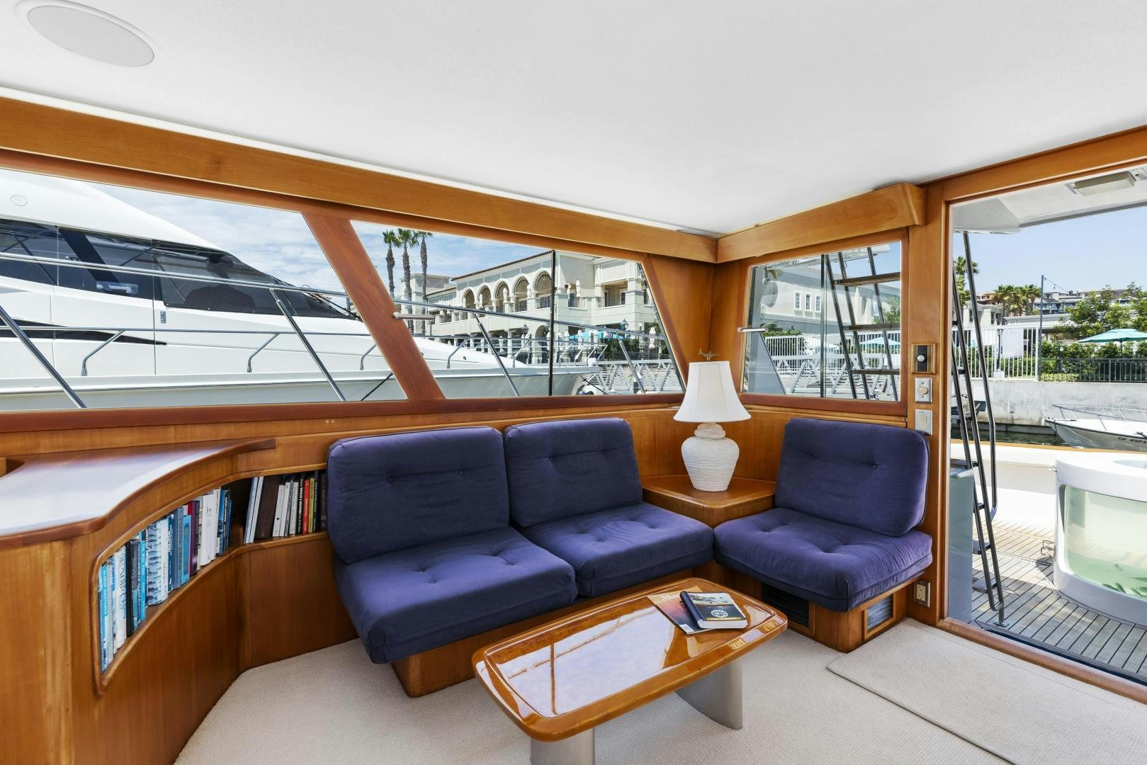 a room with a couch and a table aboard DON JUAN Yacht for Sale