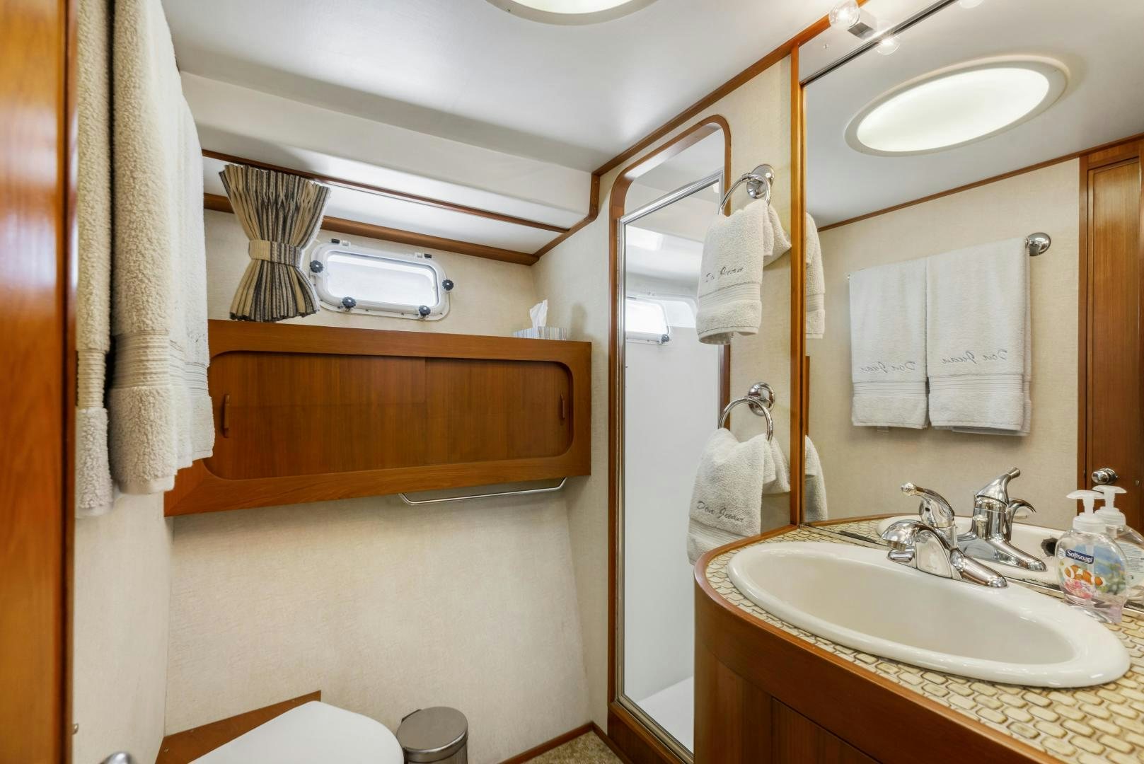 a bathroom with a shower and sink aboard DON JUAN Yacht for Sale