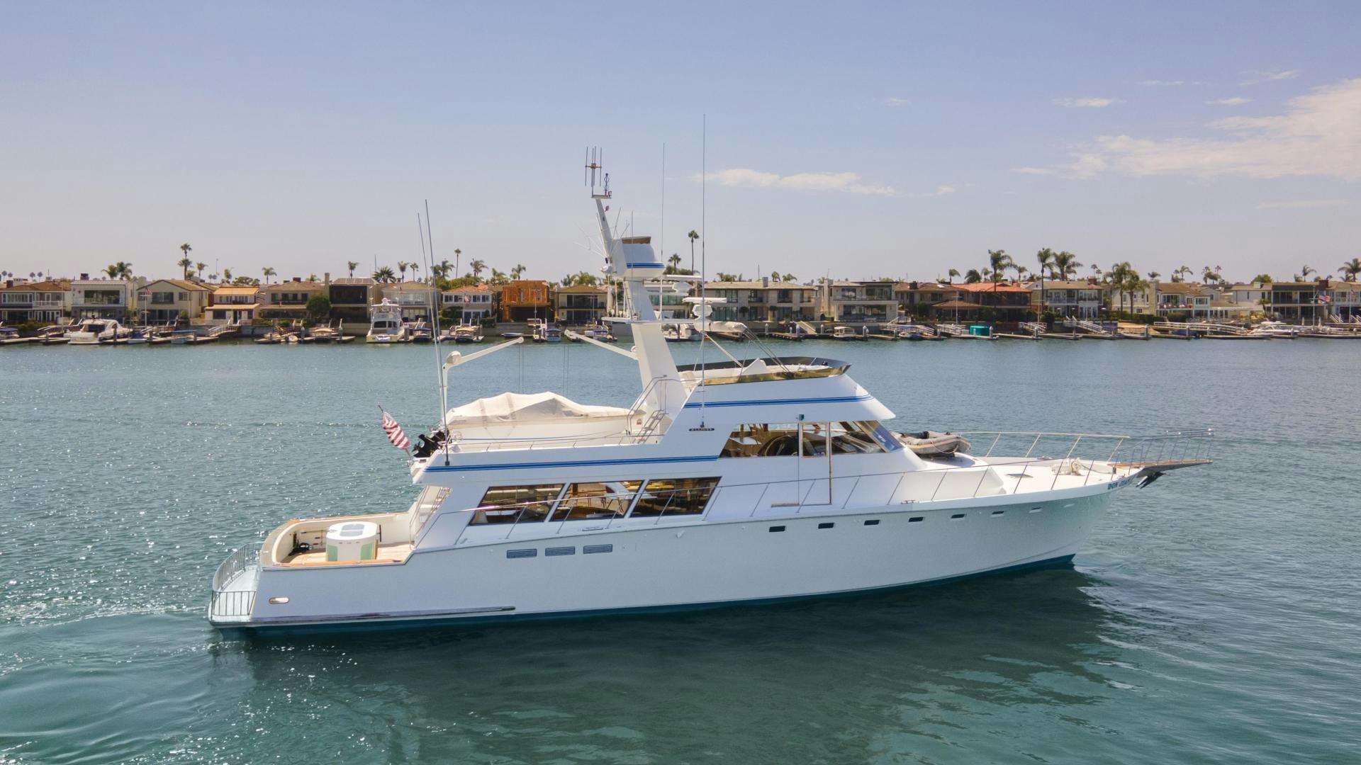 a white yacht in the water aboard DON JUAN Yacht for Sale