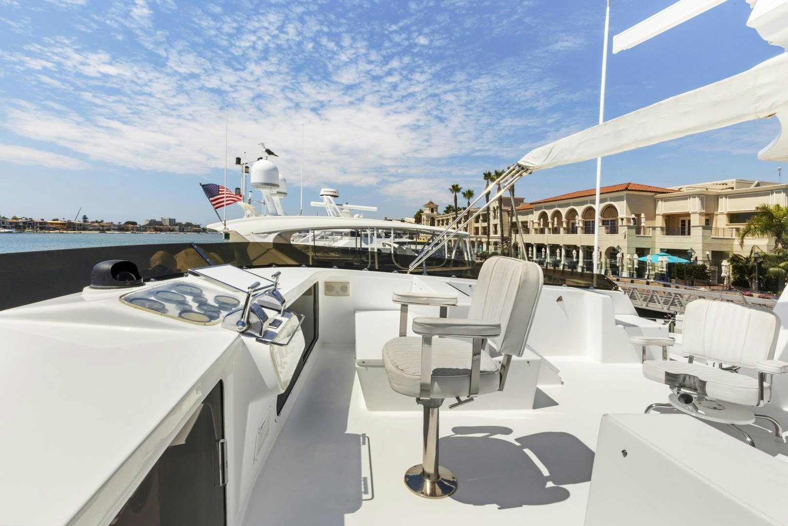 a deck with chairs and a satellite dish on it aboard DON JUAN Yacht for Sale