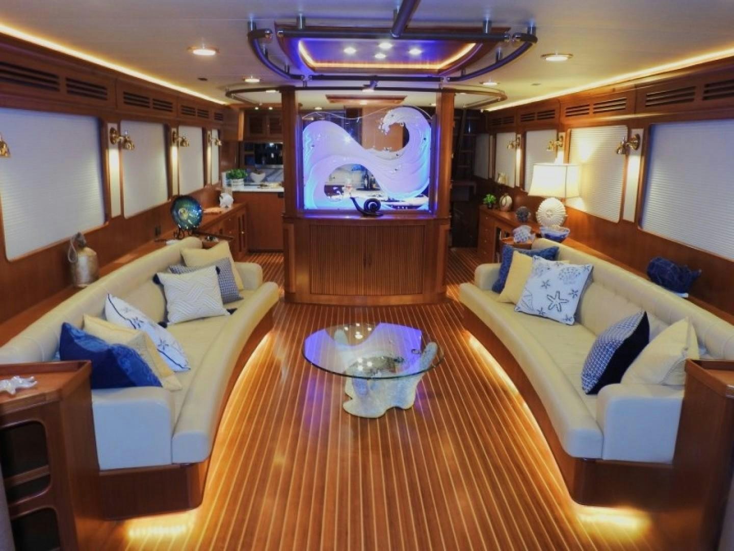a room with a couch and a table aboard AGAVE Yacht for Sale