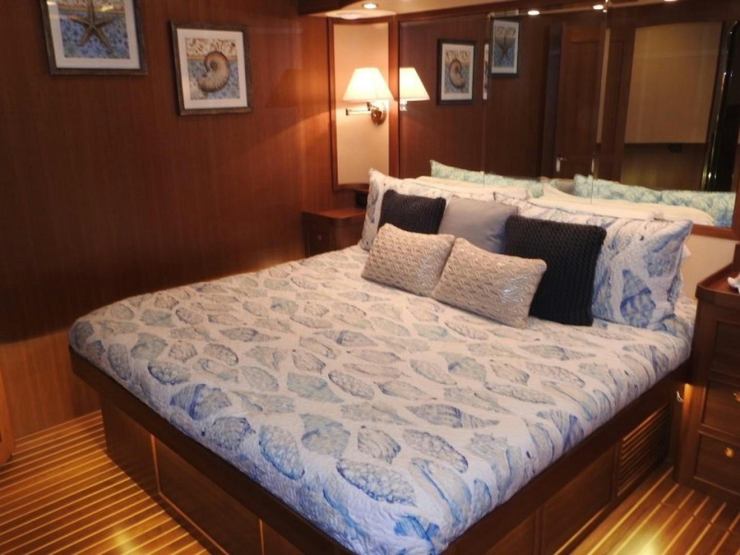 a bed with pillows aboard AGAVE Yacht for Sale