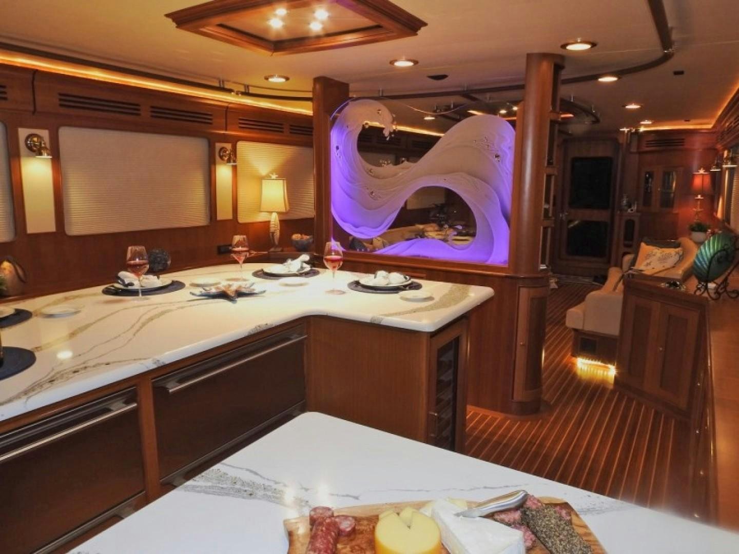 a large room with a large sculpture aboard AGAVE Yacht for Sale
