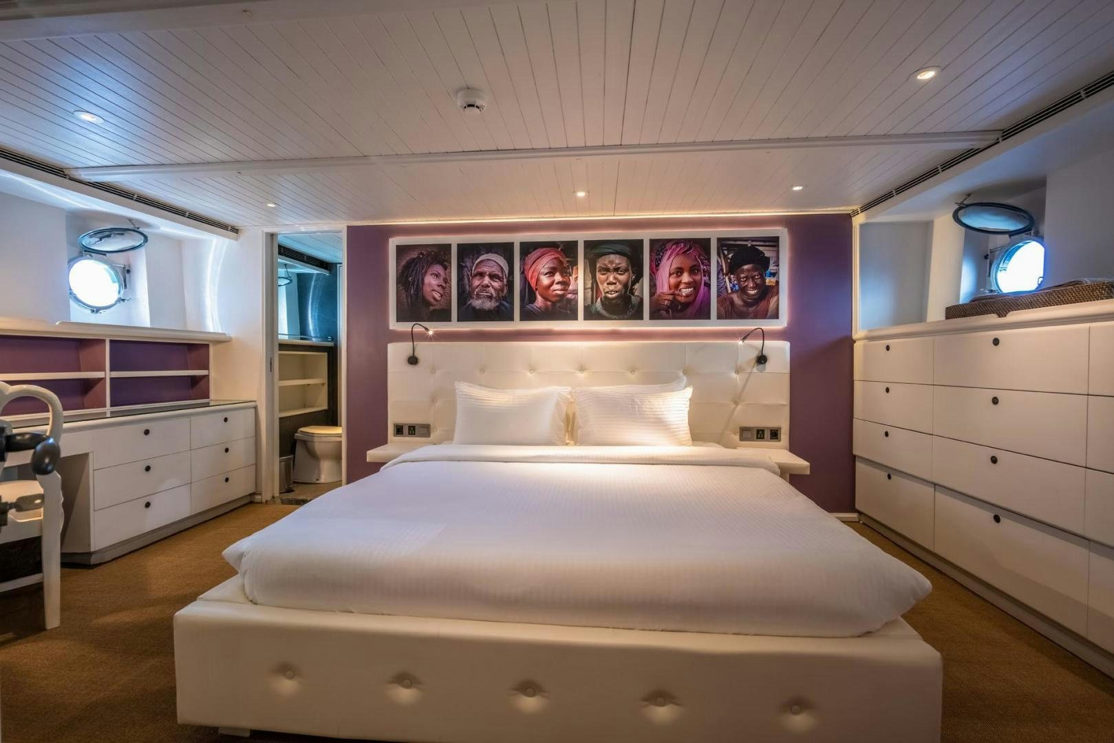 a bedroom with a large bed aboard DOUBLEYOU Yacht for Sale