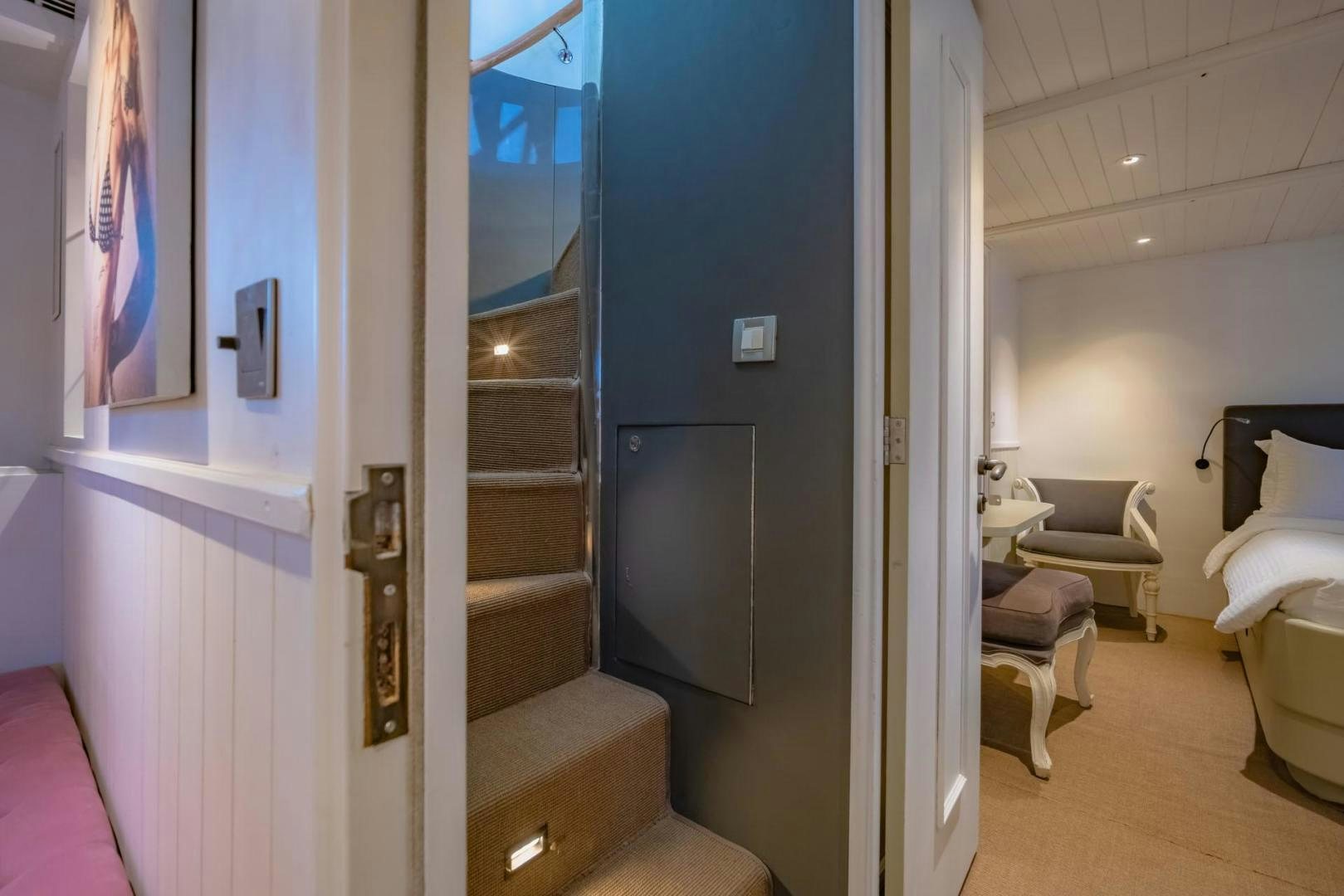 a room with a door and a mirror aboard DOUBLEYOU Yacht for Sale