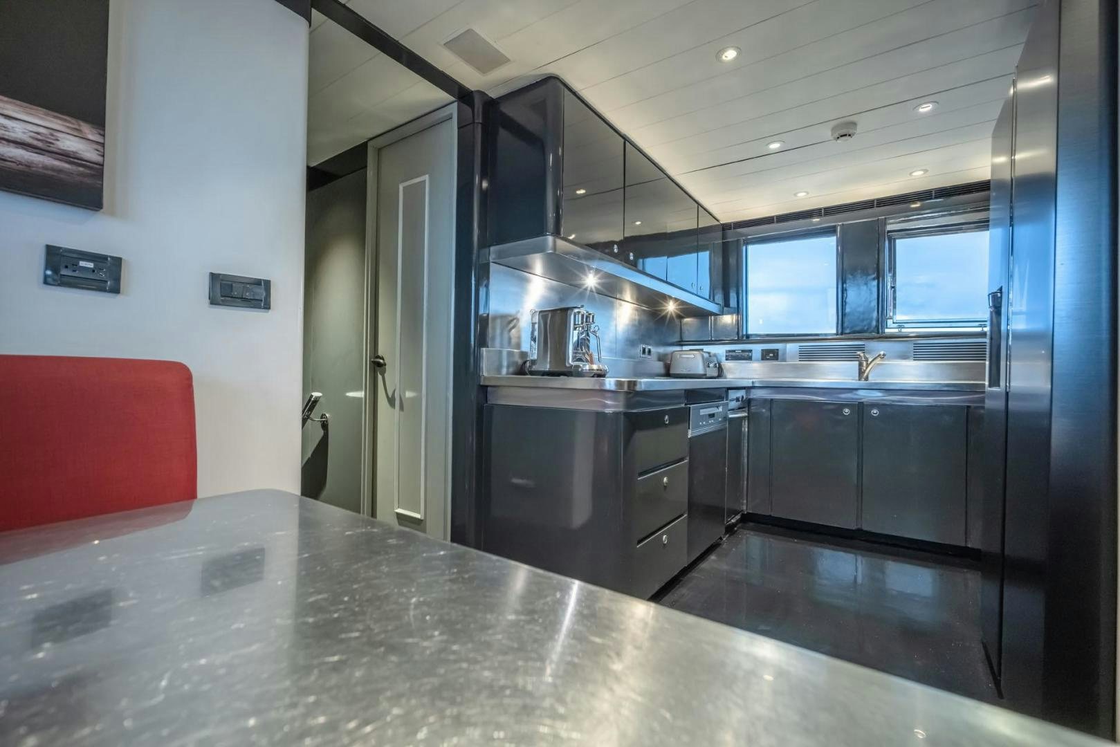 a kitchen with a large island aboard DOUBLEYOU Yacht for Sale