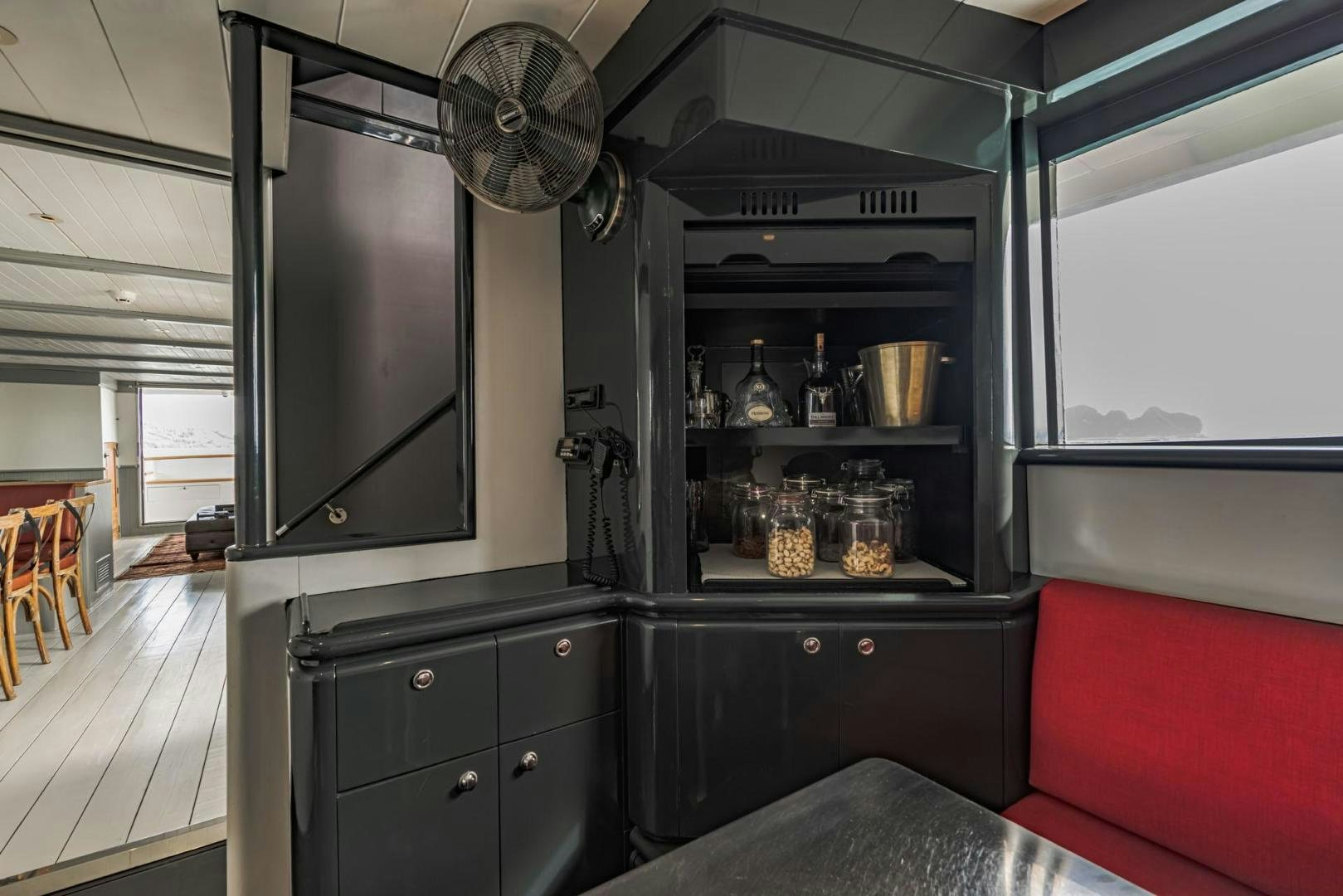 a kitchen with a large shelf aboard DOUBLEYOU Yacht for Sale