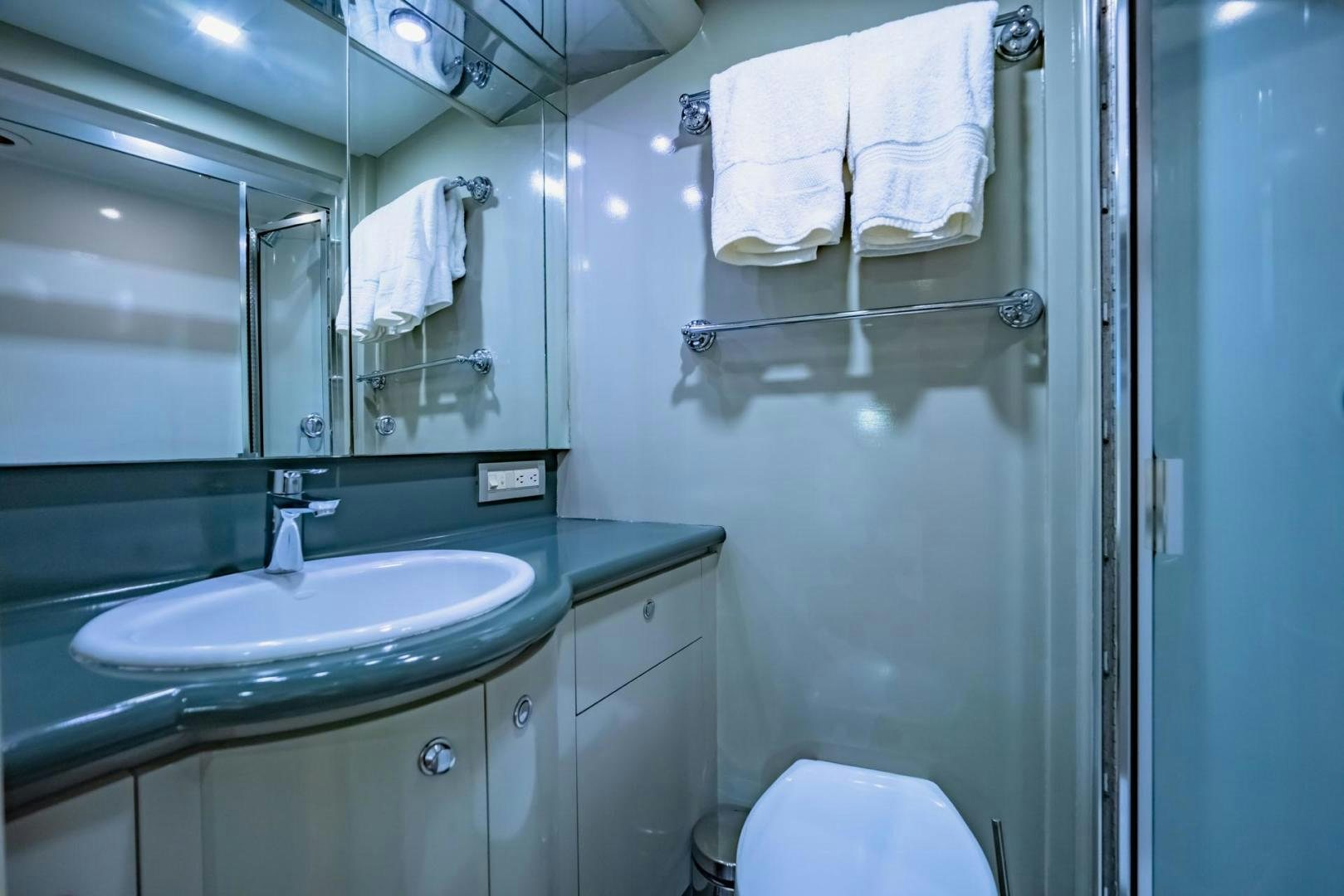 a bathroom with a sink and a mirror aboard DOUBLEYOU Yacht for Sale