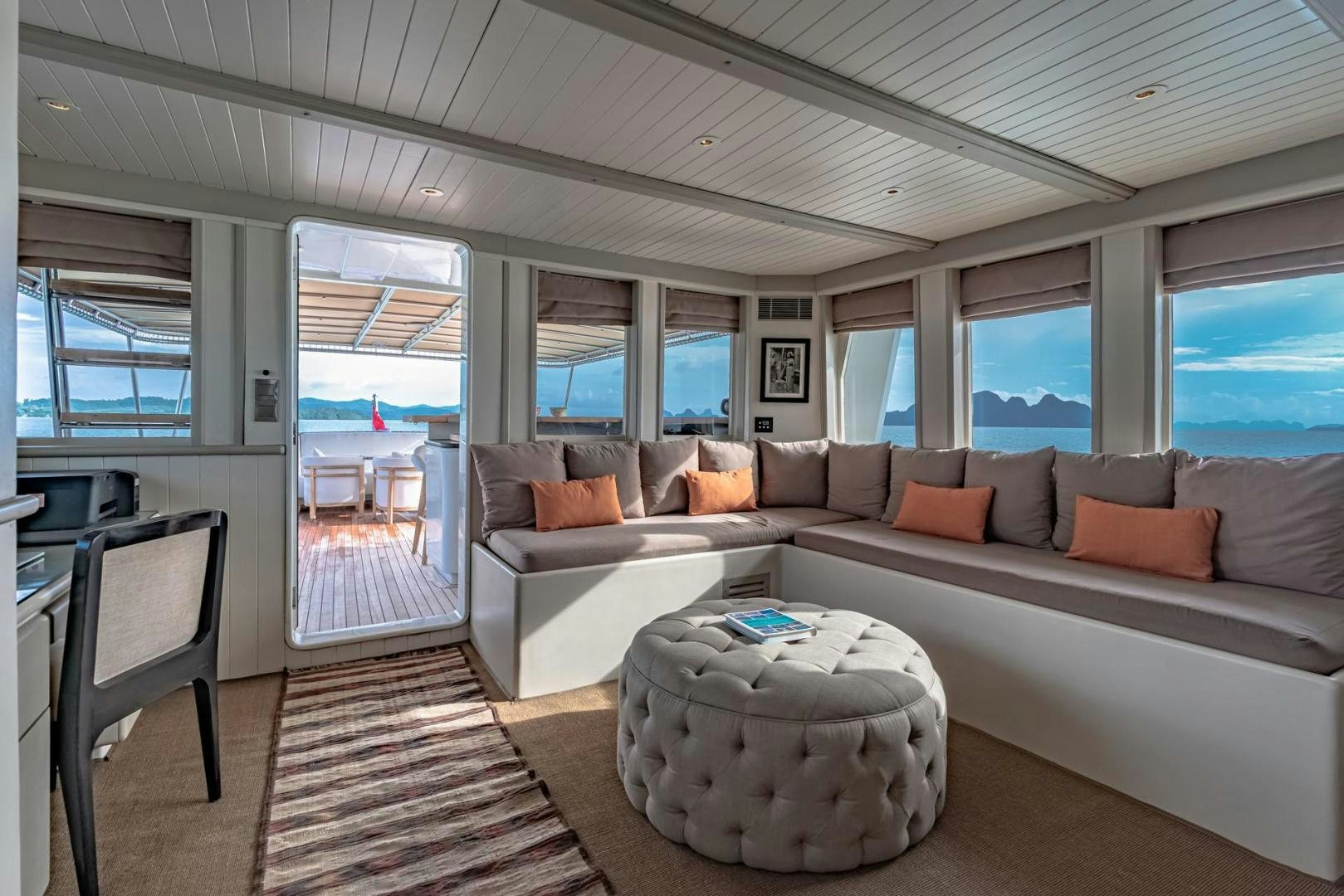 a living room with a large window aboard DOUBLEYOU Yacht for Sale