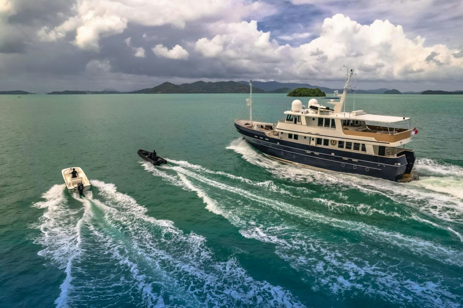 a boat and a boat in the water aboard DOUBLEYOU Yacht for Sale
