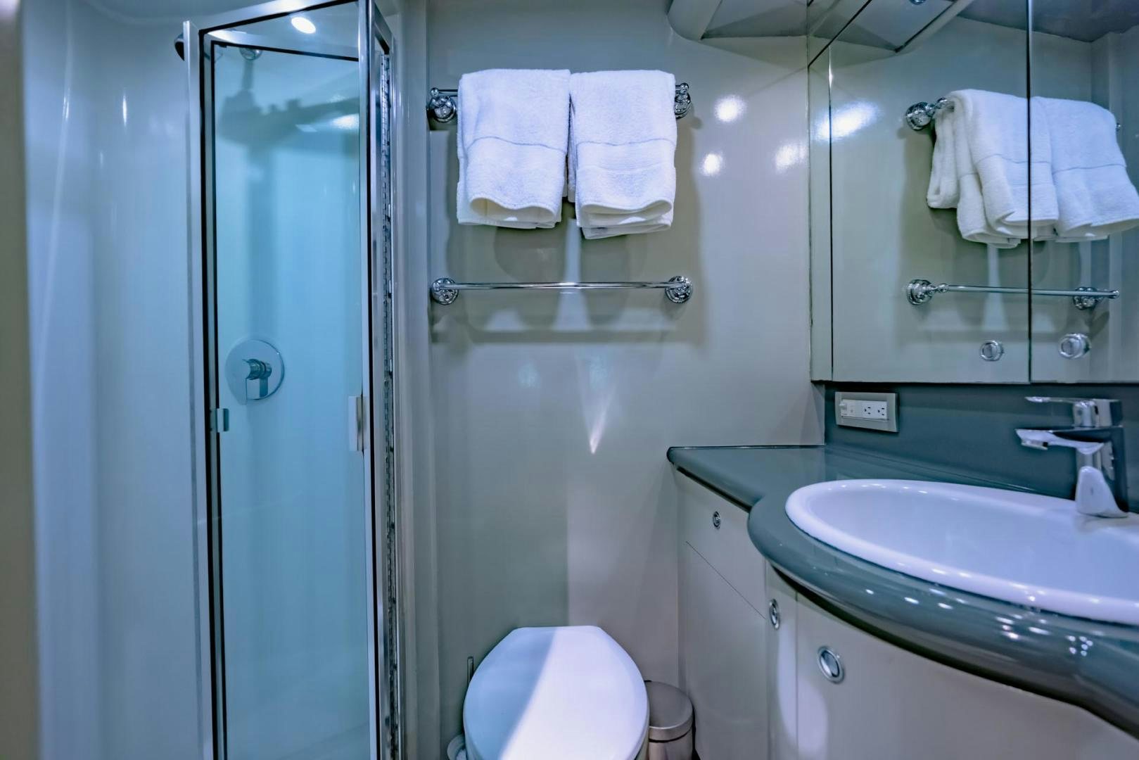 a bathroom with a sink and a toilet aboard DOUBLEYOU Yacht for Sale