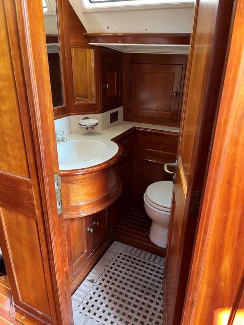 a bathroom with a sink and toilet aboard VOLTERRA Yacht for Sale