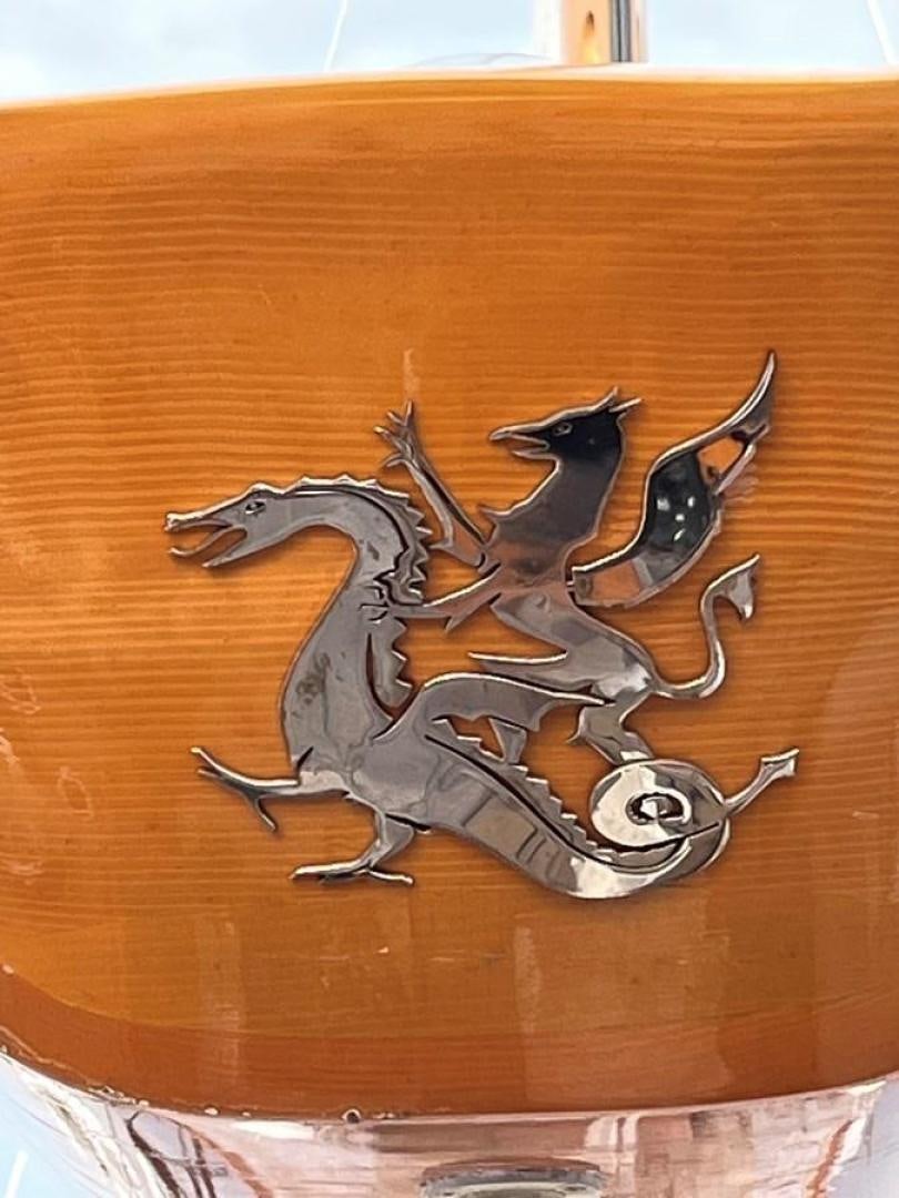 a wood carving of a dragon aboard VOLTERRA Yacht for Sale