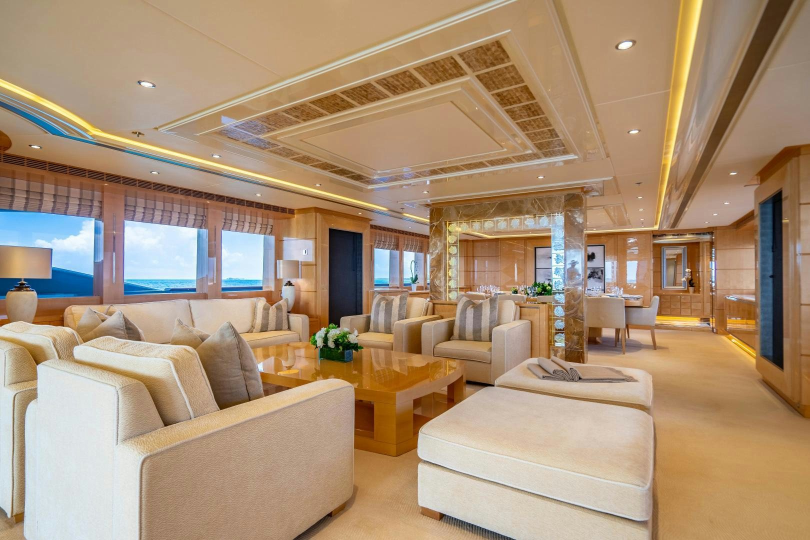 a large living room with a large open ceiling aboard SOUTH Yacht for Sale