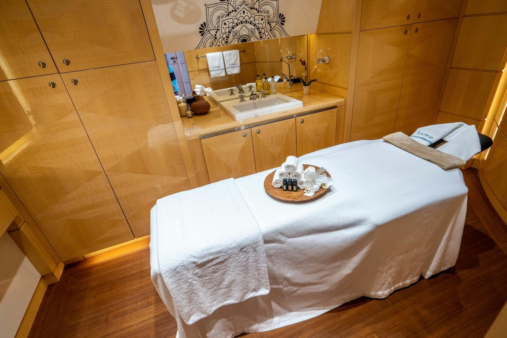 a bed with a white sheet and a white pillow on it aboard SOUTH Yacht for Sale