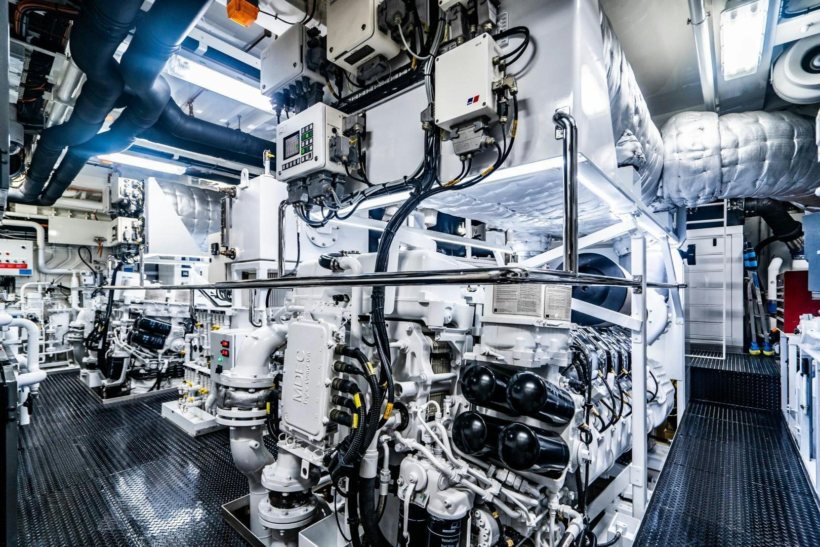 a large machine in a room aboard SOUTH Yacht for Sale