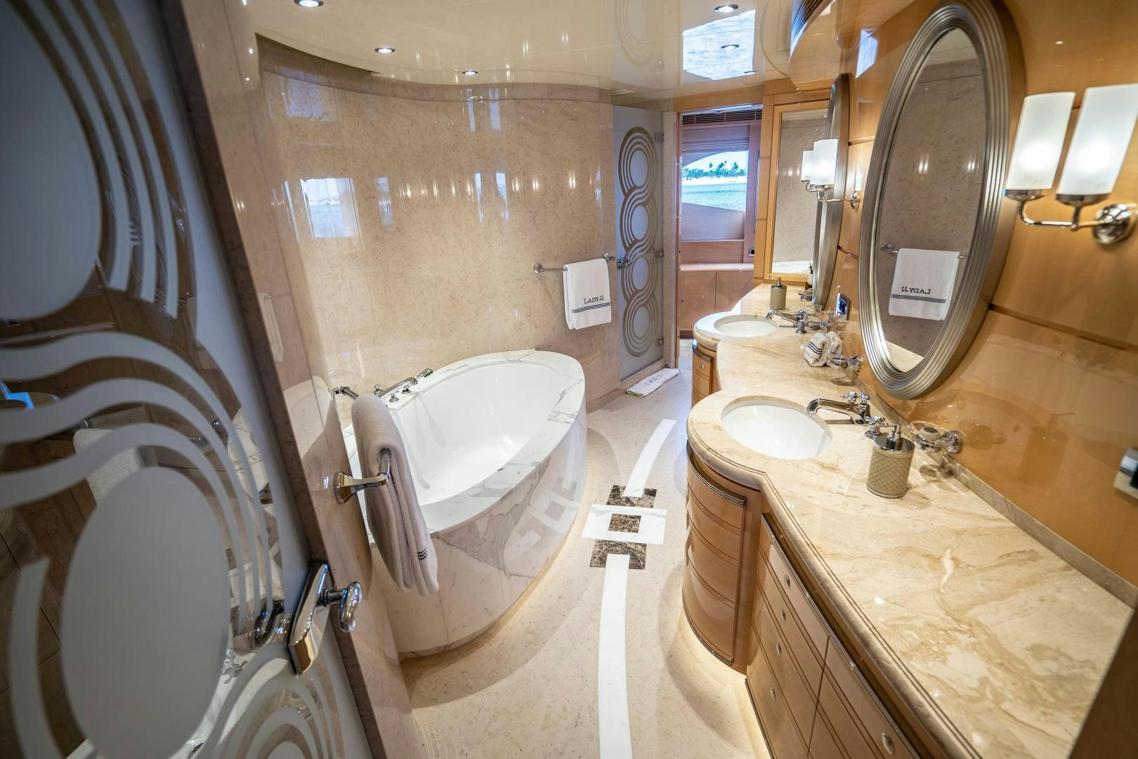 a bathroom with a large mirror aboard SOUTH Yacht for Sale