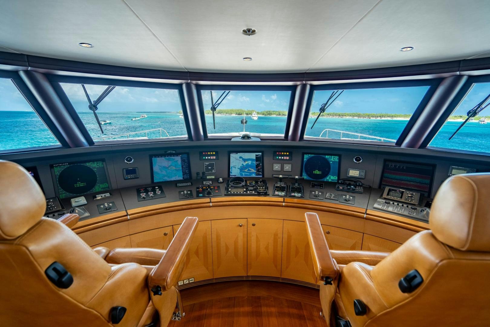inside of a vehicle with seats and screens aboard SOUTH Yacht for Sale