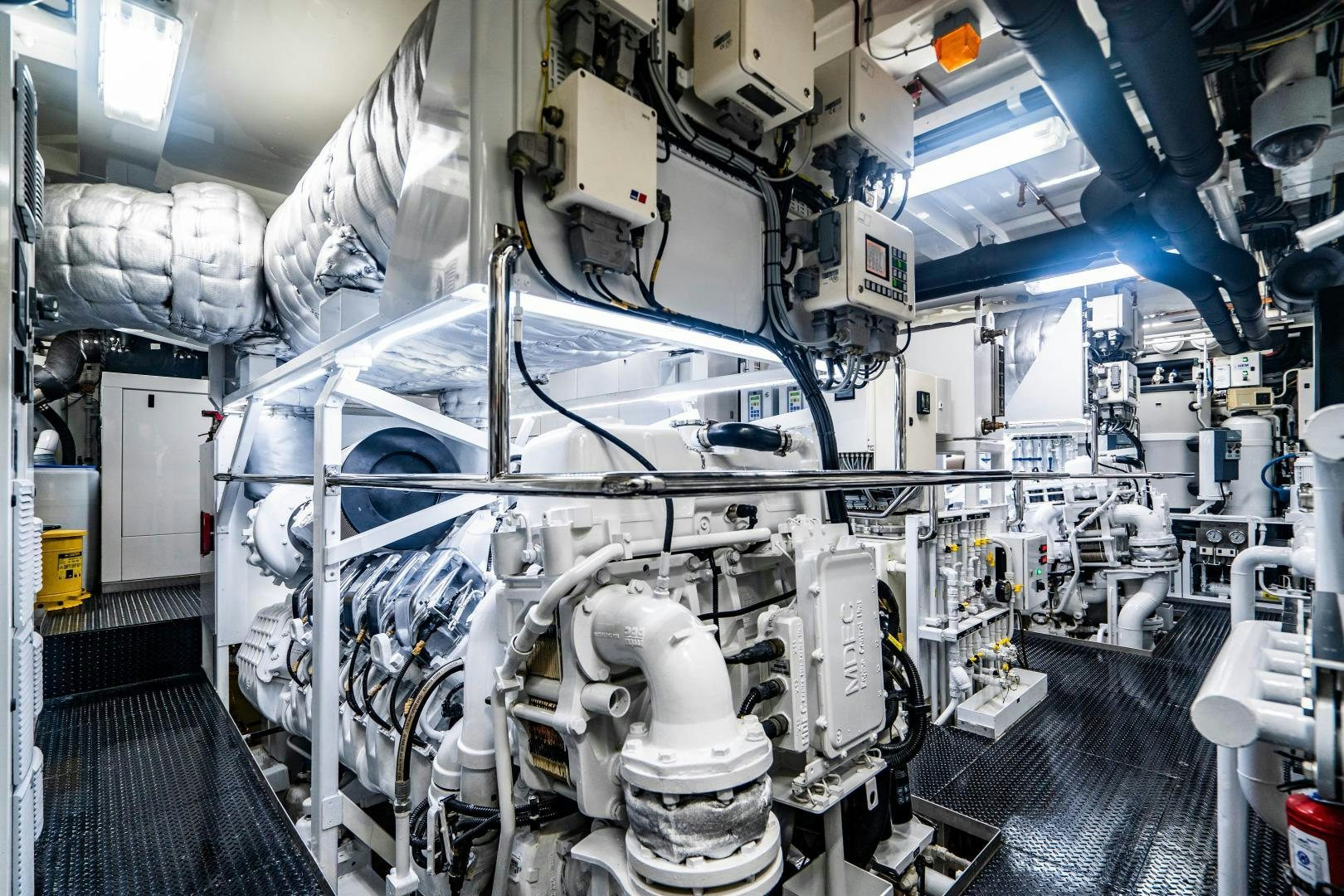 a large room with many machines aboard SOUTH Yacht for Sale