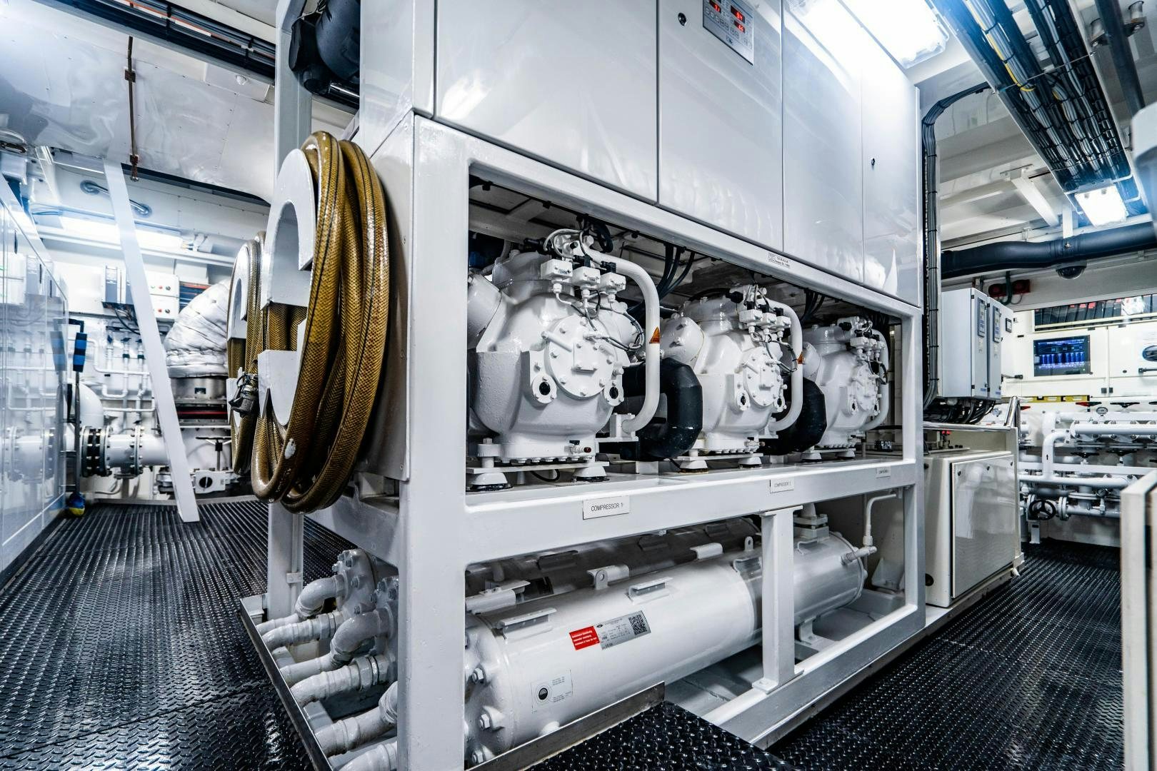 a large white machine with a large round object in it aboard SOUTH Yacht for Sale