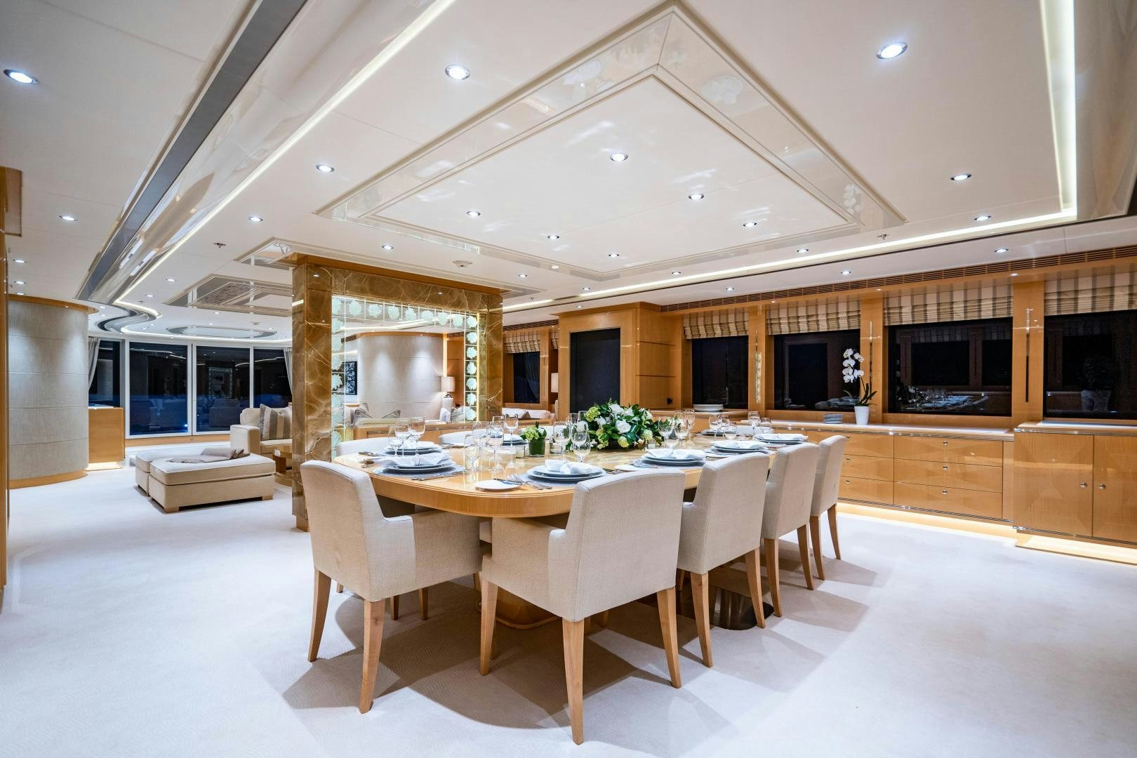 a large kitchen with a dining table aboard SOUTH Yacht for Sale