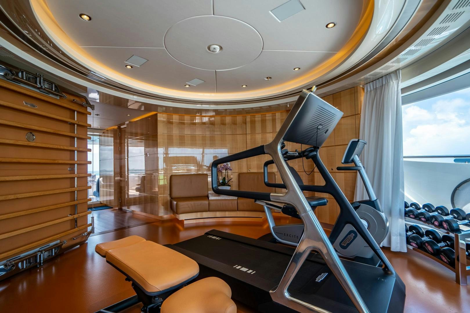 a treadmill in a room aboard SOUTH Yacht for Sale