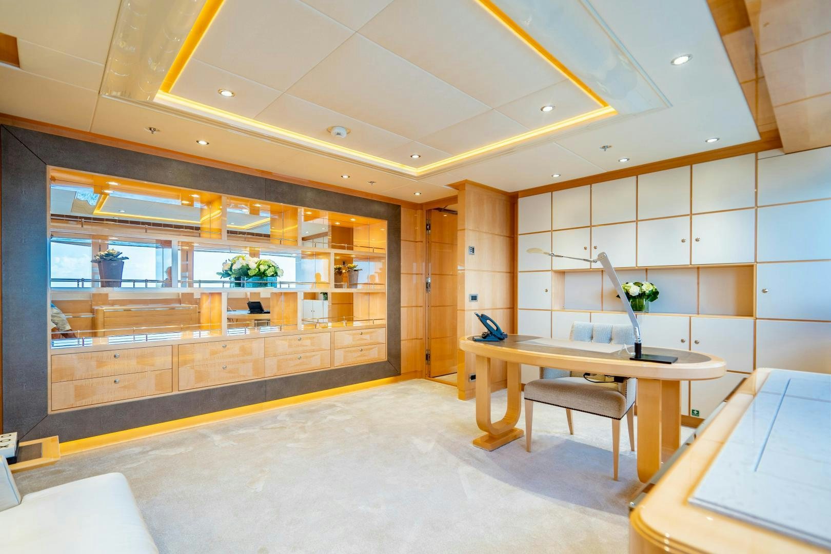 a room with a table and chairs aboard SOUTH Yacht for Sale