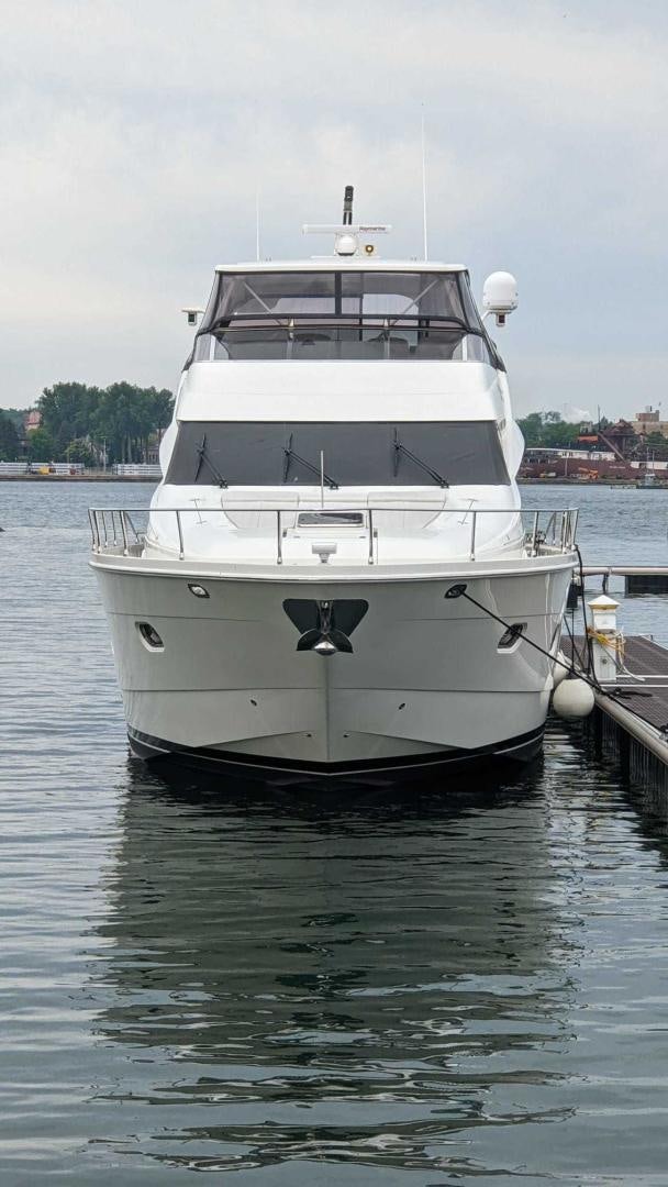 a white yacht docked aboard Casablanca II Yacht for Sale