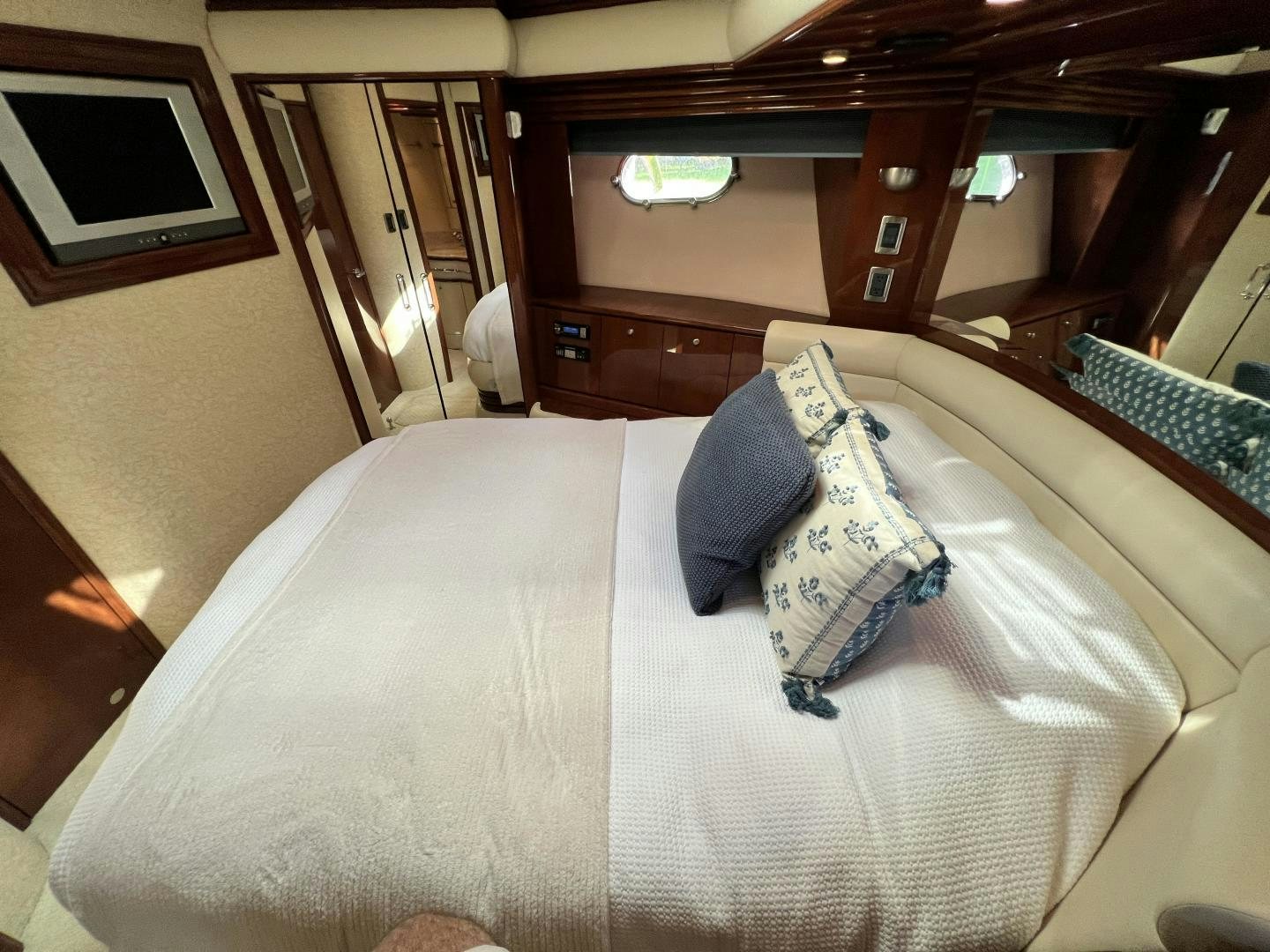 a bed with pillows aboard Casablanca II Yacht for Sale