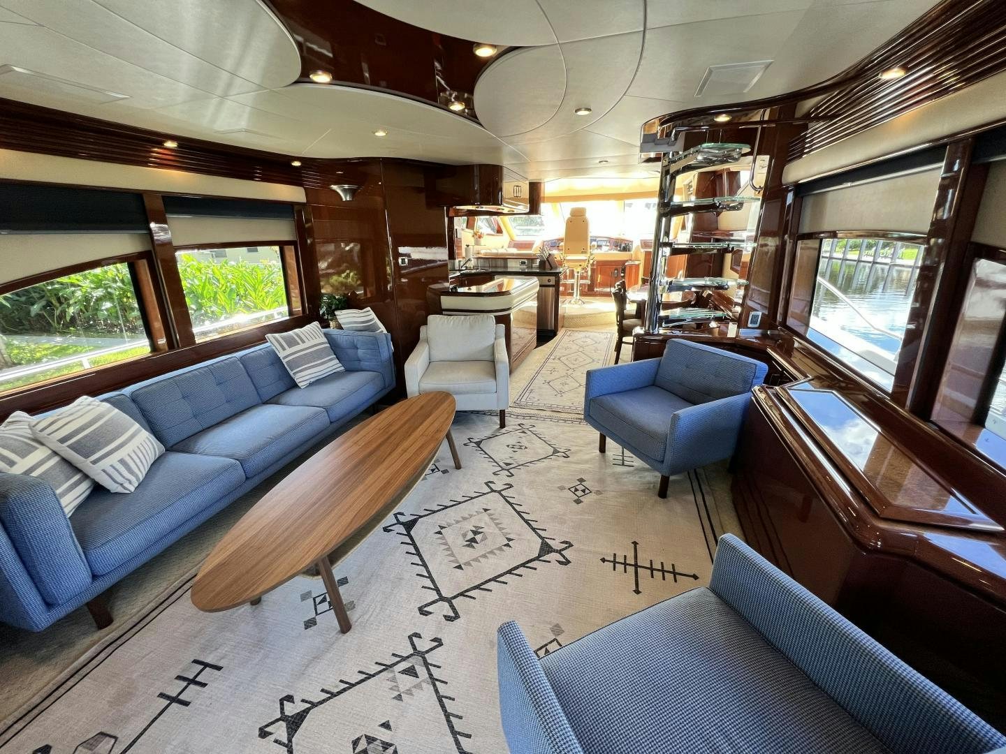 a living room with a couch and a table aboard Casablanca II Yacht for Sale