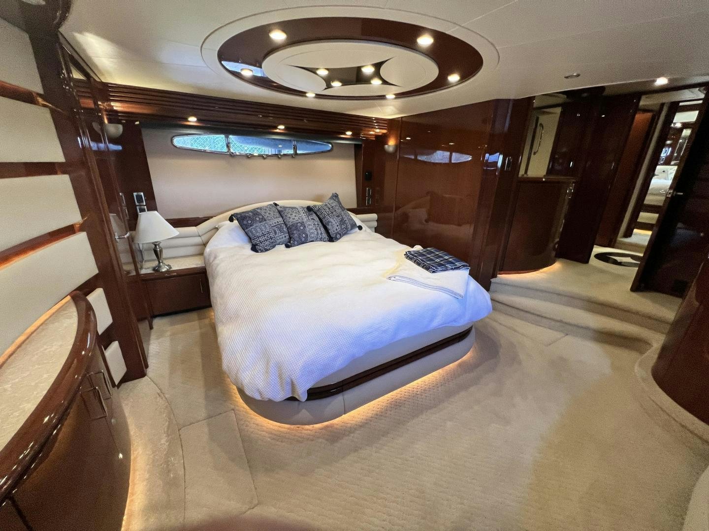 a large bedroom with a large bed aboard Casablanca II Yacht for Sale