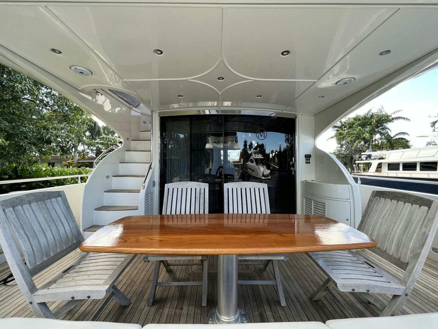 a table and chairs on a bus aboard Casablanca II Yacht for Sale