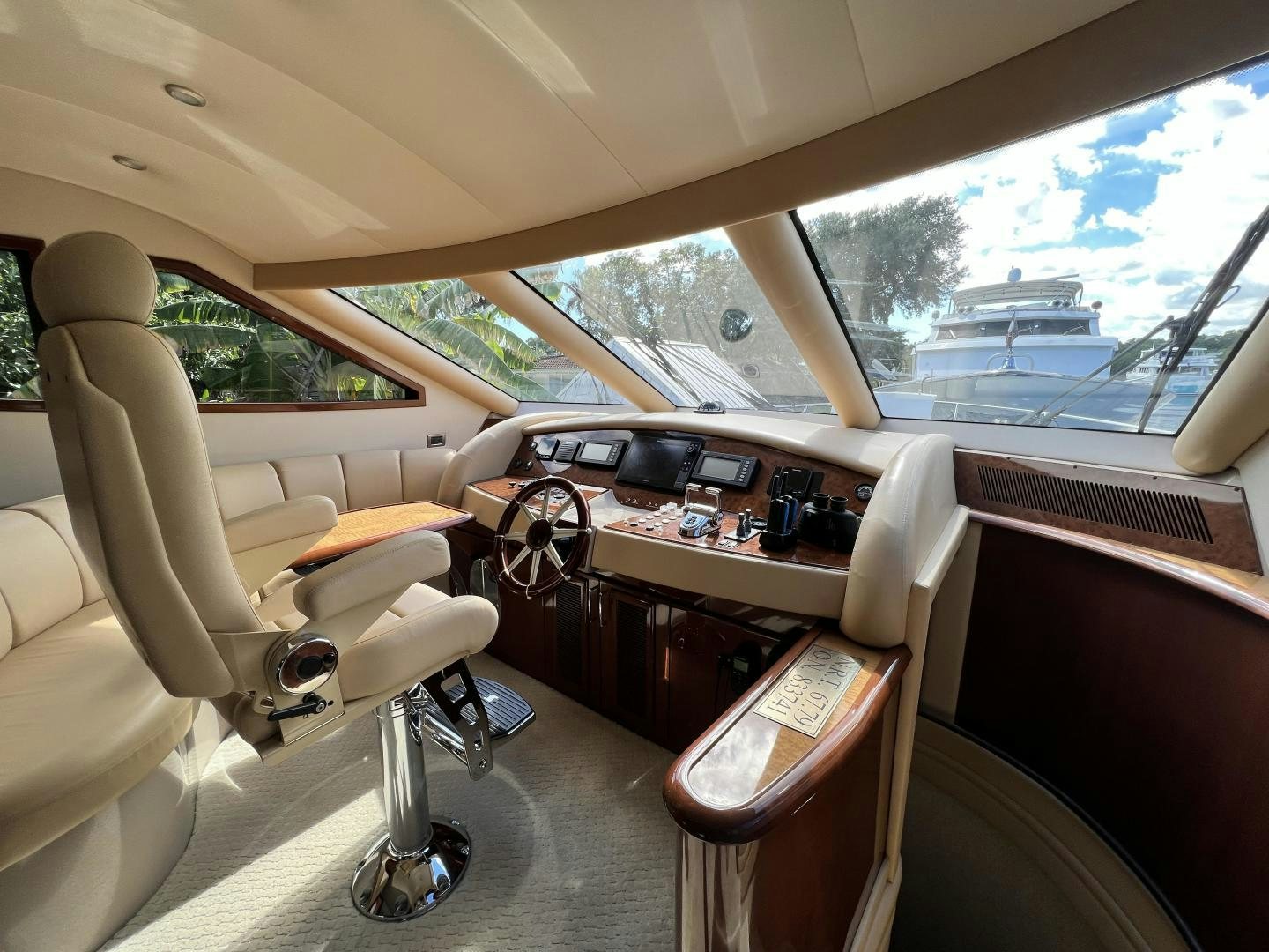 a car with a desk and chairs aboard Casablanca II Yacht for Sale