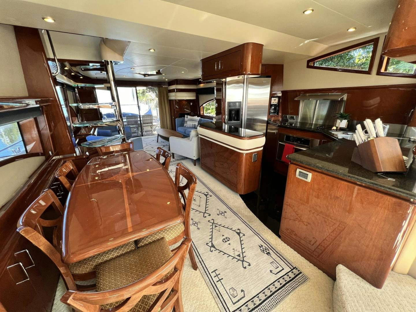 a kitchen with a dining table aboard Casablanca II Yacht for Sale