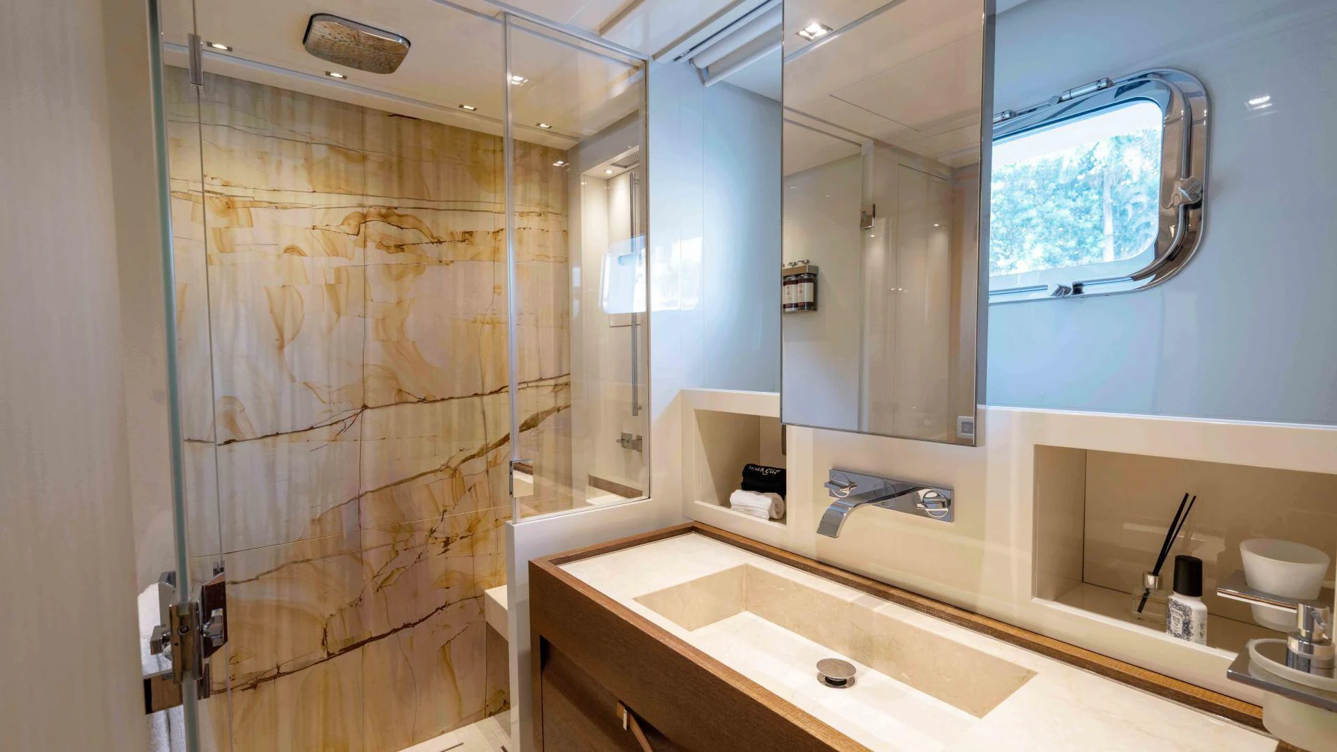 a bathroom with a glass shower aboard FREDDY Yacht for Sale