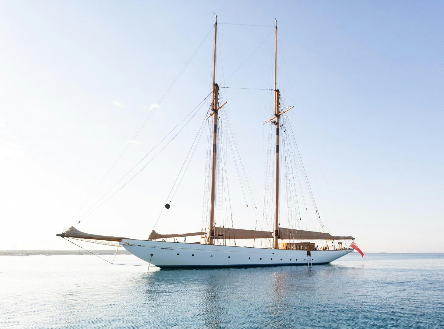 a sailboat on the water aboard NAEMA Yacht for Sale