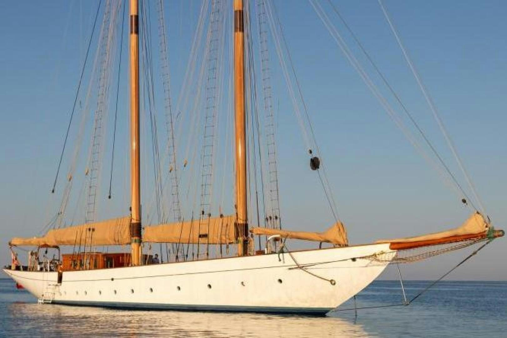 a sailboat on the water aboard NAEMA Yacht for Sale