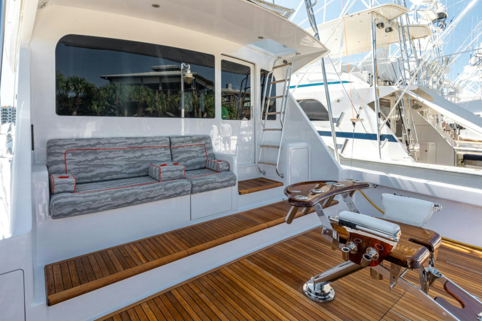 a room with a bed and a couch aboard MISS PAULA V Yacht for Sale