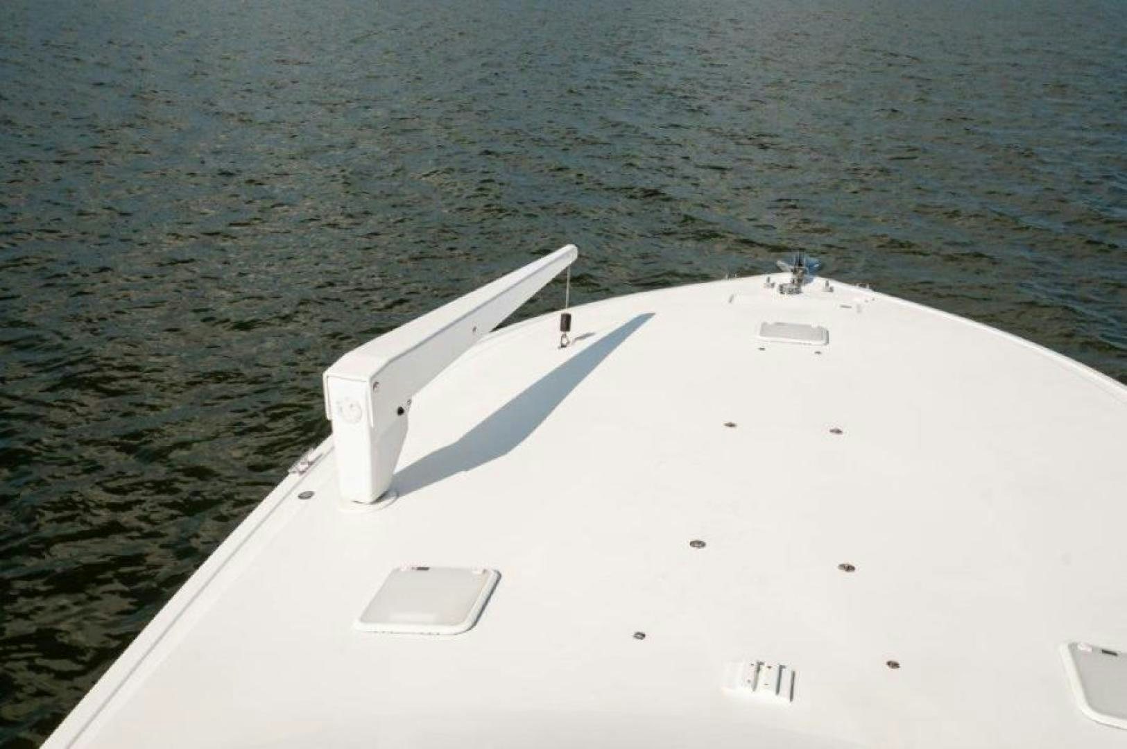 a white boat in the water aboard MISS PAULA V Yacht for Sale