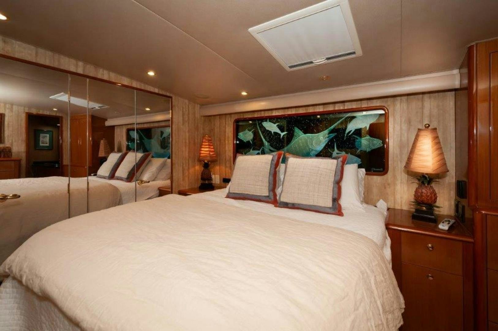 a hotel room with two beds aboard MISS PAULA V Yacht for Sale