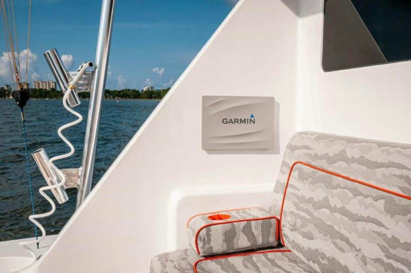 a boat with a white cover aboard MISS PAULA V Yacht for Sale