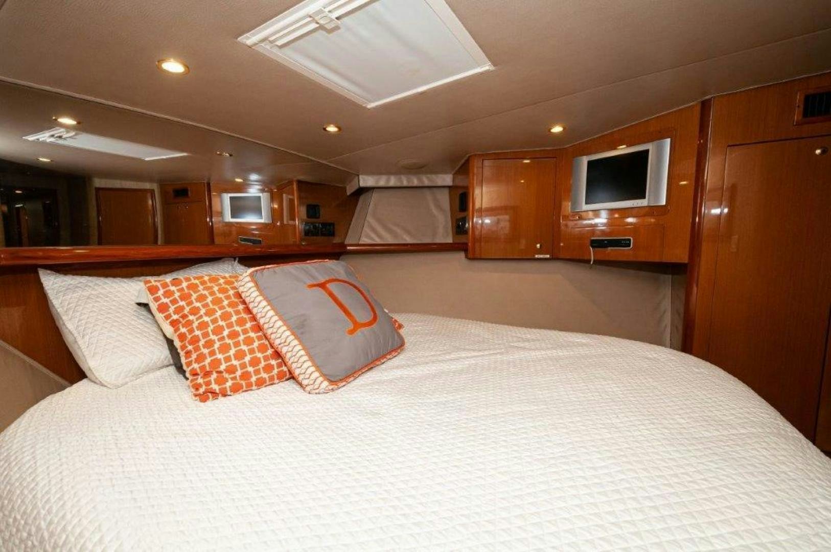 a bed with pillows on it aboard MISS PAULA V Yacht for Sale