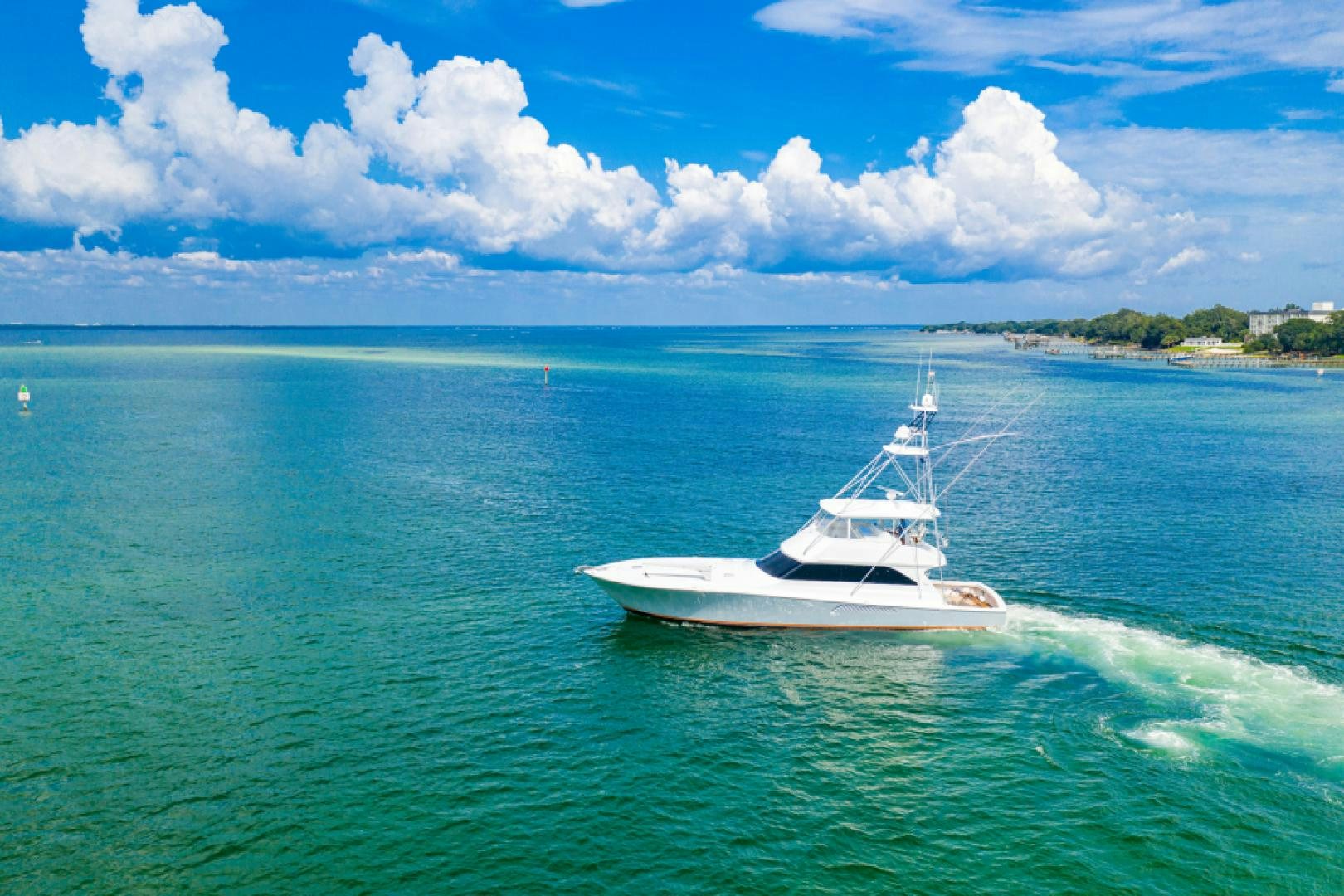 a boat on the water aboard MISS PAULA V Yacht for Sale